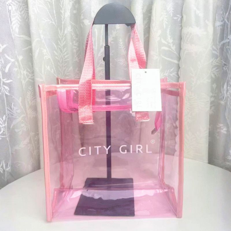 BOLSO ROSA TRANSPARENTE CITY GIRL –