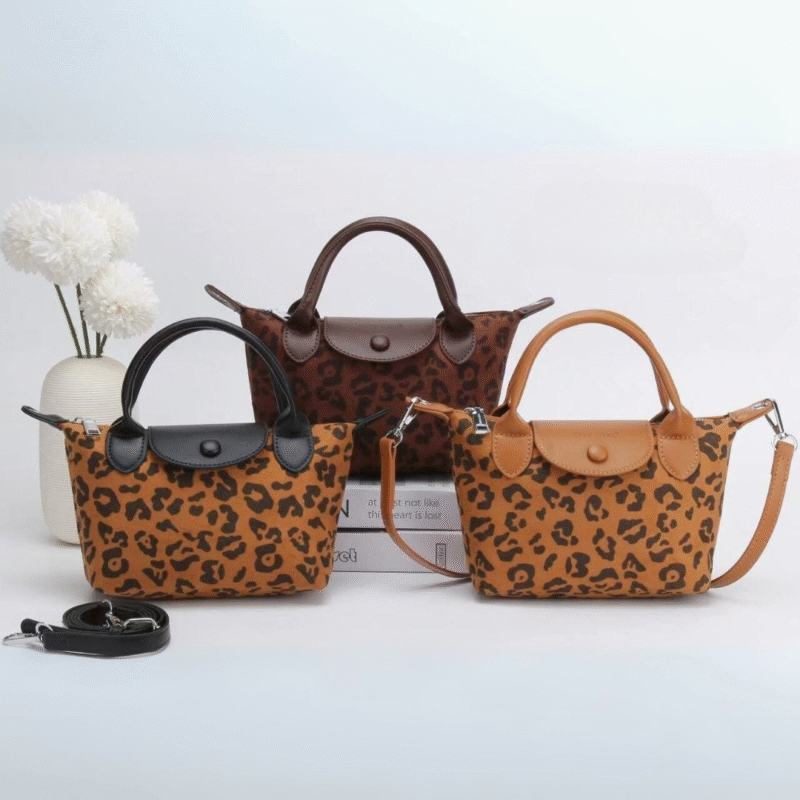 CARTERA DE MANO ANIMAL PRINT
