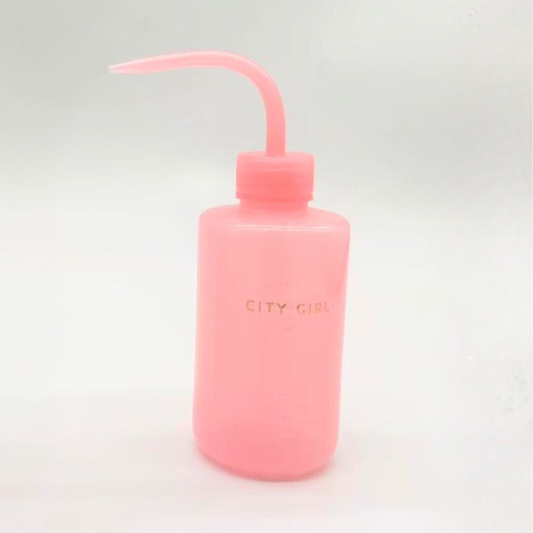 BOTELLA ROSA PICO CURVO PARA PESTAÑAS CITY GIRL