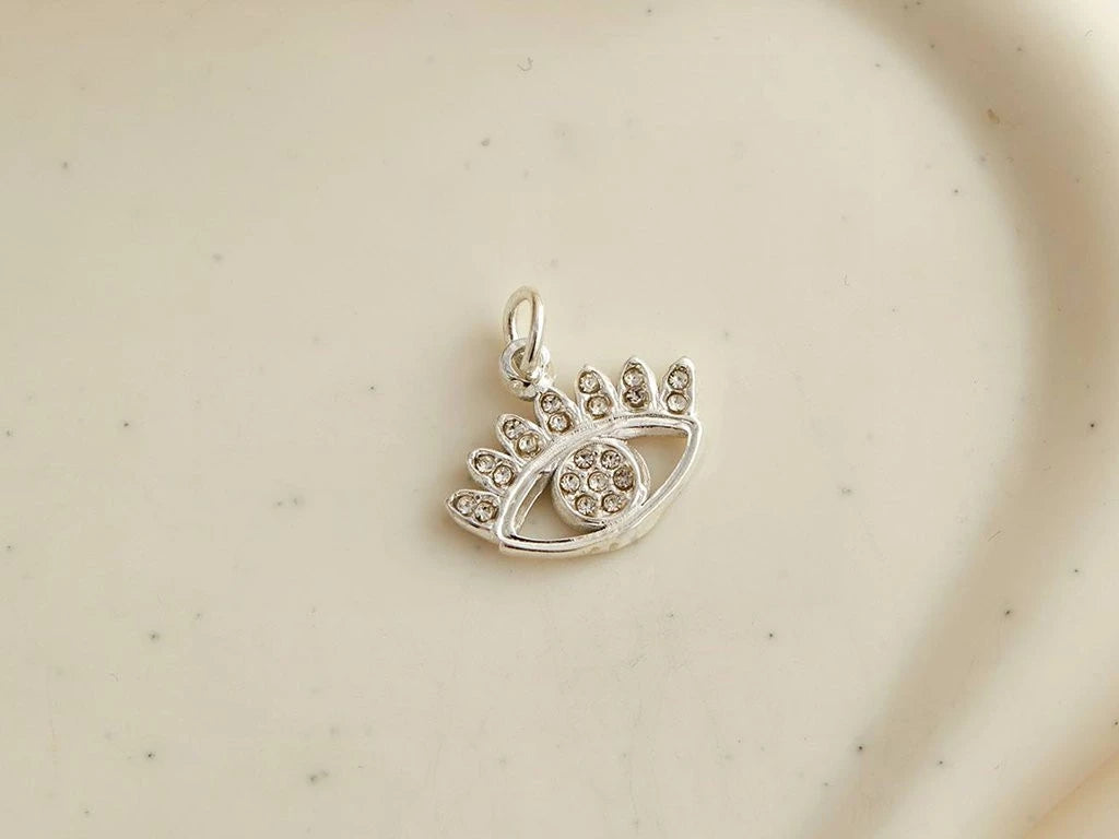 Dije Acero Blanco Ojitos con Strass Calado