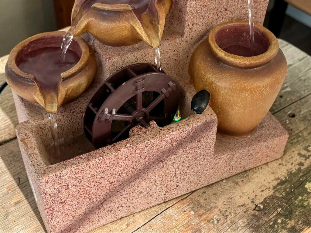 Fuentes de Agua y Jardín Zen: Set de 4 Tinajas con Rueda y Luz 22 cm