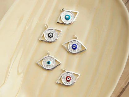 Dije de acero dorado/blanco/acero con ojos blanco x1